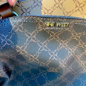 Brown and tan Nine West purse.